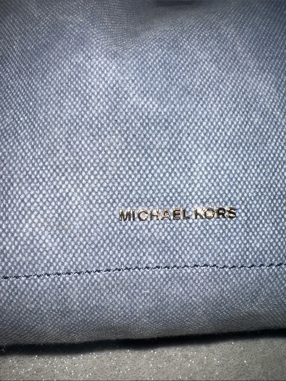 Michael Kors Isla Large Tote Bag, washed denim with signature rope handles.